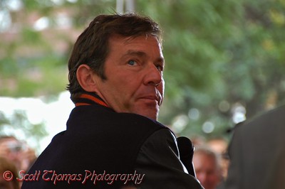 Dennis Quaid, who plays Coach Ben Schwartzwalder in the movie, The Express, looks back at the Ernie Davis statue while addressing the audience.